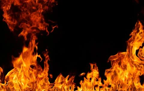 Fire flames on black background. Stock Photos