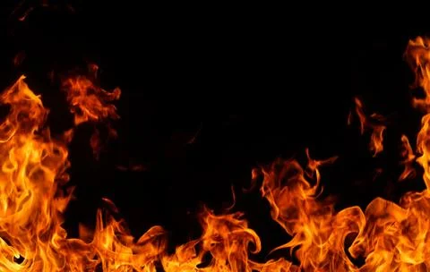 Fire flames on black background. Stock Photos