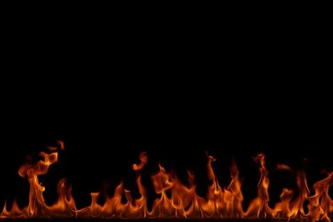 Fire flames on black background. Stock Photos