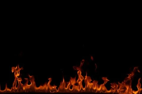 Fire flames on black background. Stock Photos