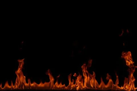 Fire flames on black background. Stock Photos