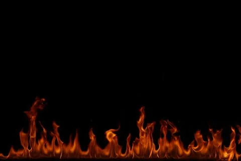 Fire flames on black background. Stock Photos