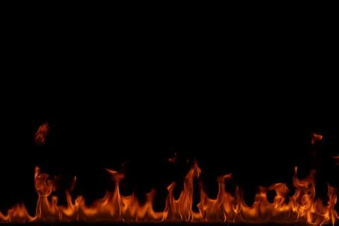 Fire flames on black background. Stock Photos