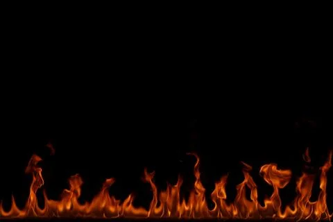 Fire flames on black background. Stock Photos