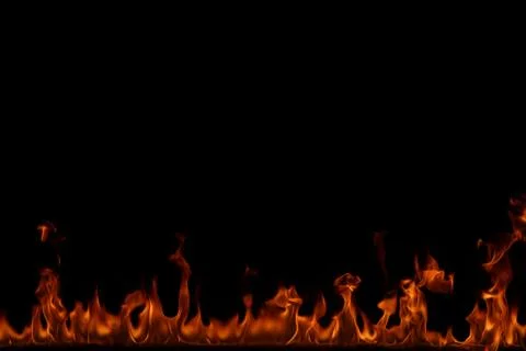 Fire flames on black background. Stock Photos