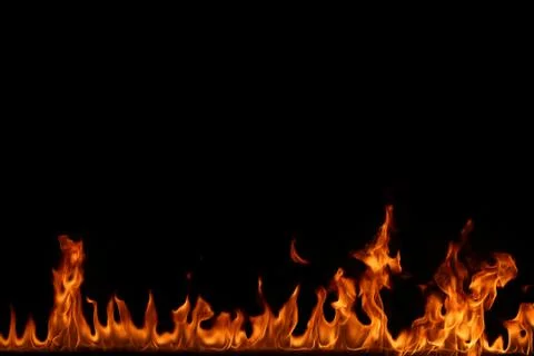 Fire flames on black background. Stock Photos