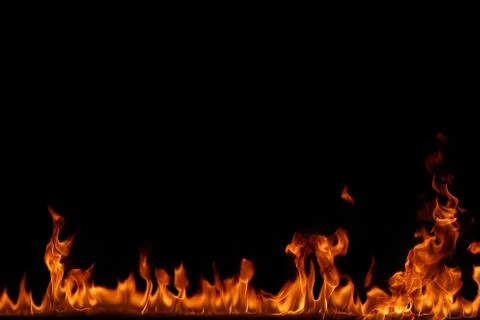 Fire flames on black background. Stock Photos