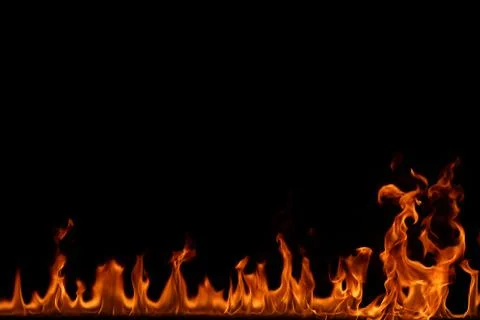 Fire flames on black background. Stock Photos