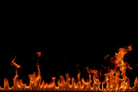 Fire flames on black background. Stock Photos