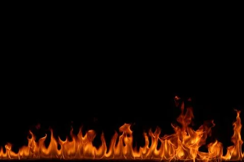 Fire flames on black background. Stock Photos