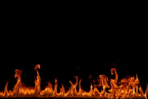 Fire flames on black background. Stock Photos