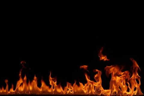 Fire flames on black background. Stock Photos