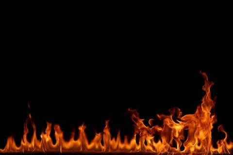 Fire flames on black background. Stock Photos