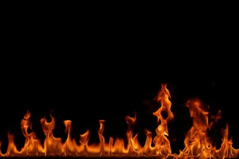 Fire flames on black background. Stock Photos