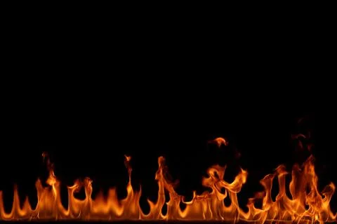 Fire flames on black background. Stock Photos