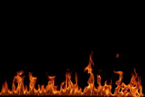 Fire flames on black background. Stock Photos