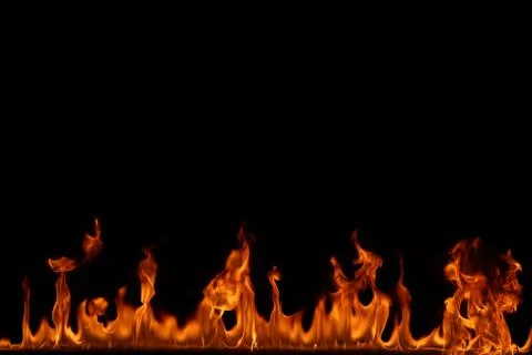 Fire flames on black background. Stock Photos