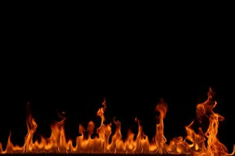 Fire flames on black background. Stock Photos