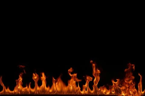 Fire flames on black background. Stock Photos