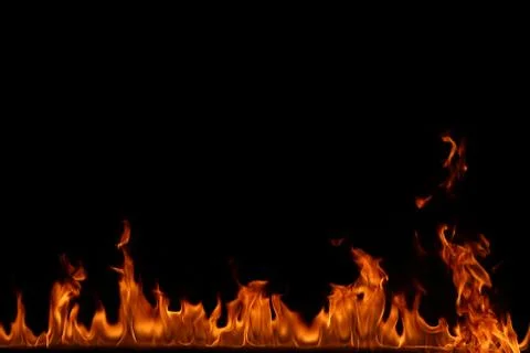 Fire flames on black background. Stock Photos