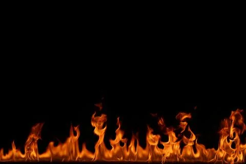 Fire flames on black background. Stock Photos