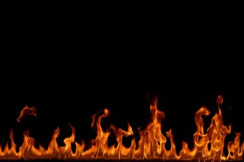 Fire flames on black background. Stock Photos