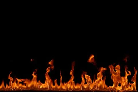 Fire flames on black background. Stock Photos