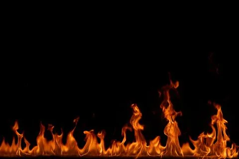 Fire flames on black background. Stock Photos