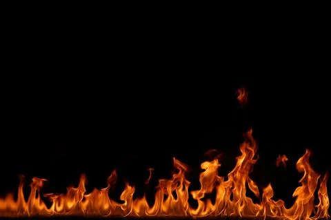 Fire flames on black background. Stock Photos