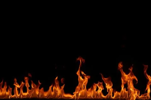 Fire flames on black background. Stock Photos
