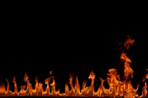 Fire flames on black background. Stock Photos
