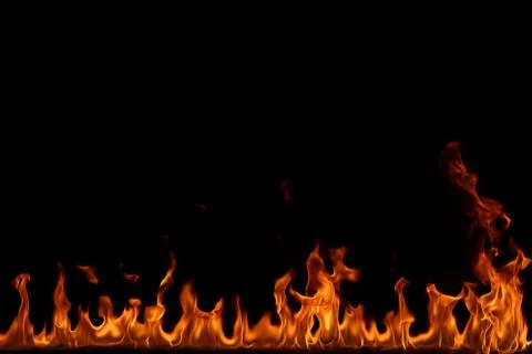 Fire flames on black background. Stock Photos