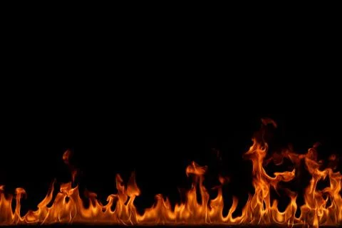 Fire flames on black background. Stock Photos