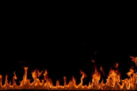 Fire flames on black background. Stock Photos