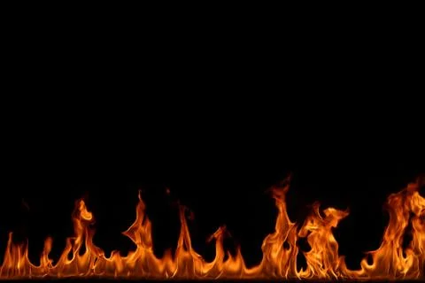 Fire flames on black background. Stock Photos