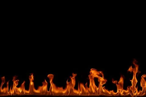 Fire flames on black background. Stock Photos