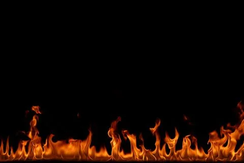 Fire flames on black background. Stock Photos