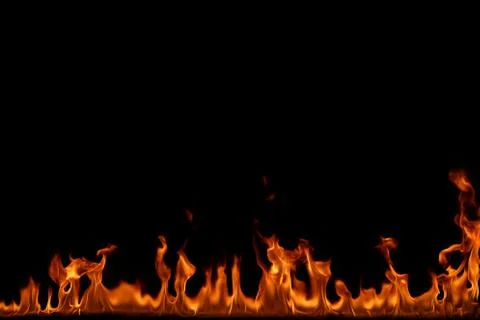 Fire flames on black background. Stock Photos