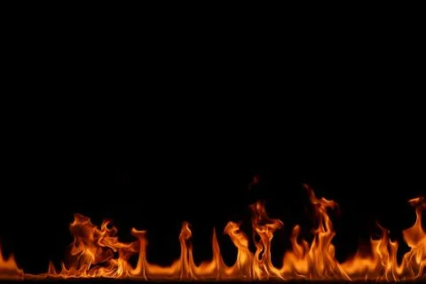 Fire flames on black background. Stock Photos