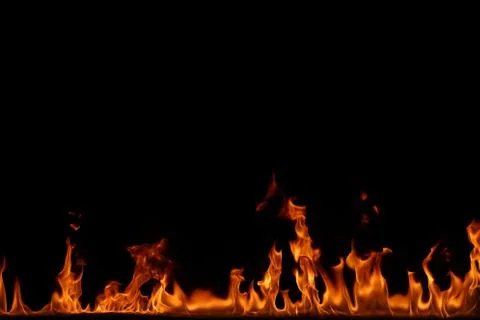 Fire flames on black background. Stock Photos