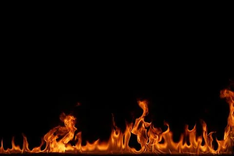 Fire flames on black background. Stock Photos