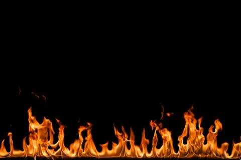 Fire flames on black background. Stock Photos