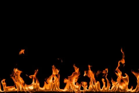Fire flames on black background. Stock Photos
