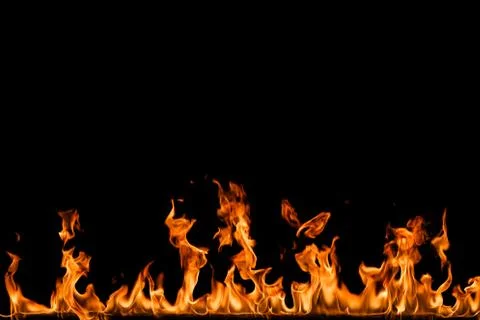 Fire flames on black background. Stock Photos