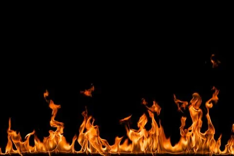 Fire flames on black background. Stock Photos