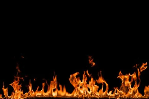 Fire flames on black background. Stock Photos