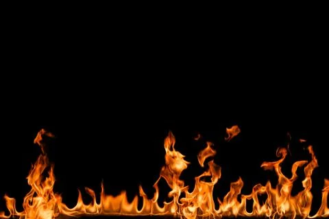 Fire flames on black background. Stock Photos