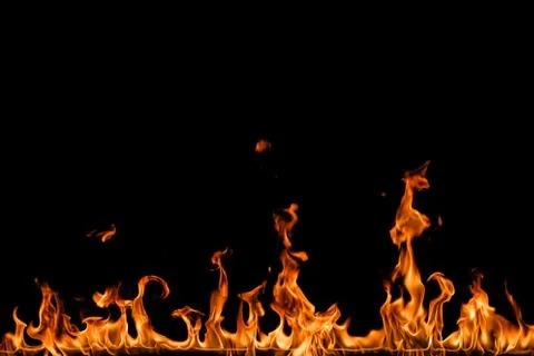 Fire flames on black background. Stock Photos