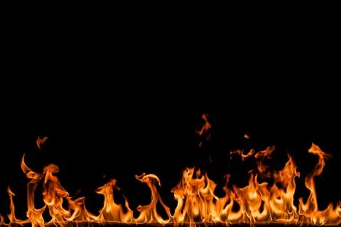 Fire flames on black background. Stock Photos