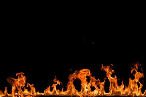 Fire flames on black background. Stock Photos